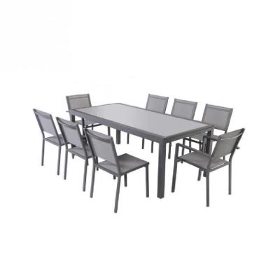 Ensemble table extensible 200 - 300 cm + 8 chaises gris aluminium et plateau verre pour 701