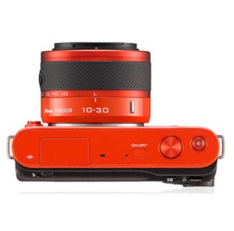 Nikon 1 J2 Orange + Obj. 1 Nikkor CX VR 10 - 30 mm f/ 3.5 - 5.6