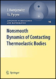 Nonsmooth dynamics of contacting thermoelastic bodies