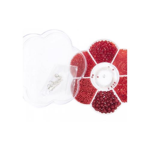 Perles de rocaille rouge dans boite fleur