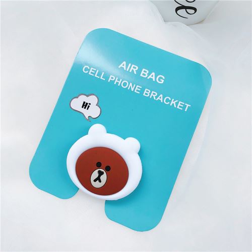 Support de téléphone mignon de bande dessinée universelle Ours en silicone sur blanc