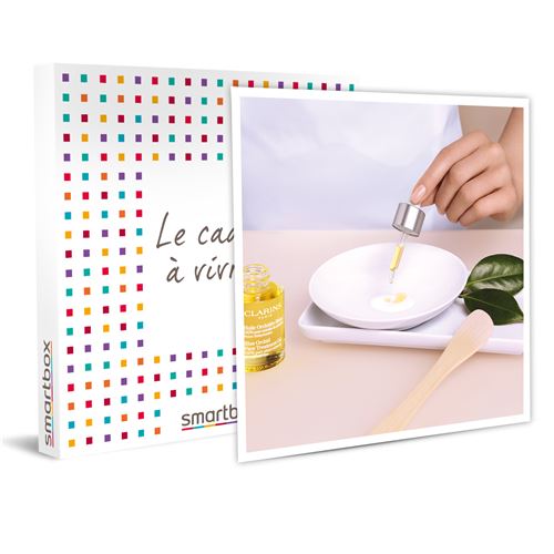 SMARTBOX - Pause Bien-être en Boutique & Spa Clarins : soin visage et 20€ de bon d’achat sur les produits Clarins - Coffret Cadeau