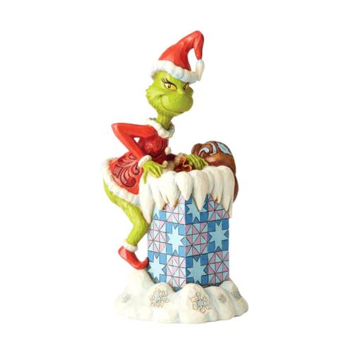 Dr. Seuss Le Grinch grimpant dans une figurine de cheminée