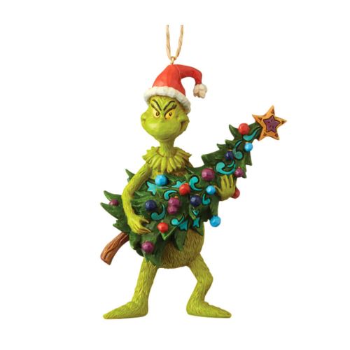 Dr. Seuss Grinch tenant un ornement de sapin de Noël suspendu