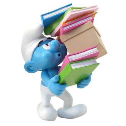 Figurine - Schtroumpf portant une pile de livres