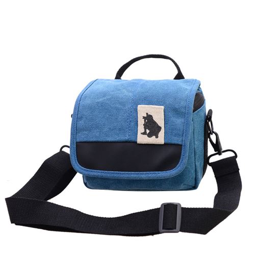 Sac à bandoulière pour appareil photo mirrorless, en toile, couleur bleue, dimensions 17×11×8 cm.