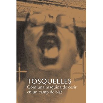 Tosquelles. com una màquina de cosir en un camp de blat