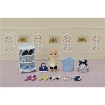 La valisette de mode Sylvanian Families Grande sœur chien Caramel