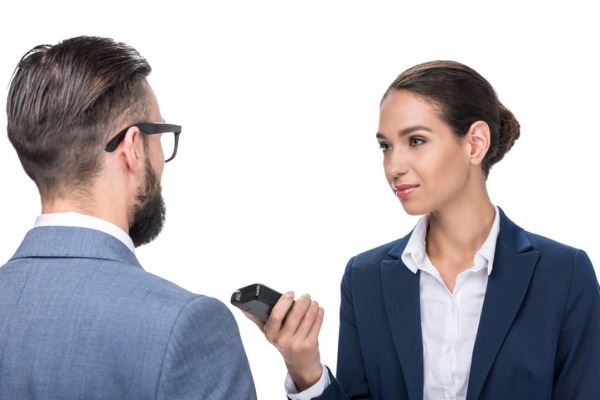 female-journalist-taking-interview-with-businessman-isolated-on-white-picture-id835232450