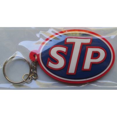 porte clé STP bleu ecrit blanc plastique souple huile usa