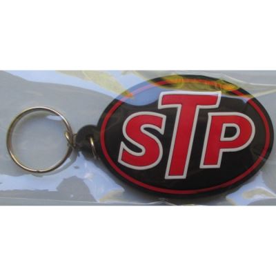 porte clé STP noir ecrit rouge plastique souple huile usa