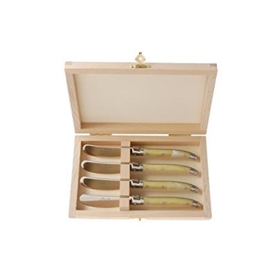 Laguiole ménagère avec 4 couteaux à beurre en bois ivoire