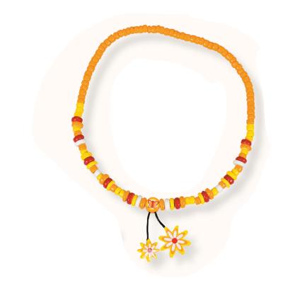 Collier 2 pendentifs : fleur jaune le coin des enfants