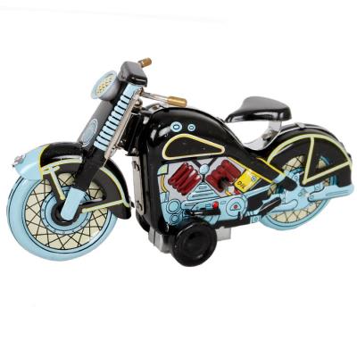 Jouet mécanique Moto Harley Davidson noire en tôle à remonter avec une clé