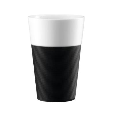 Bodum set de 2 mugs en porcelaine avec bande silicone bistro 0,6 l noir et blanc