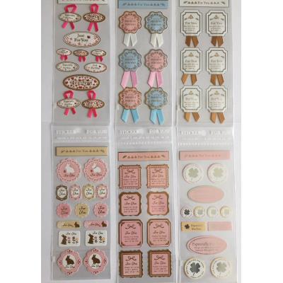 NOVAGO® 3 planches stickers autocollants série rubans pour fermer et décorer les paquets et pochettes cadeaux (3 motifs différents aléatoires)