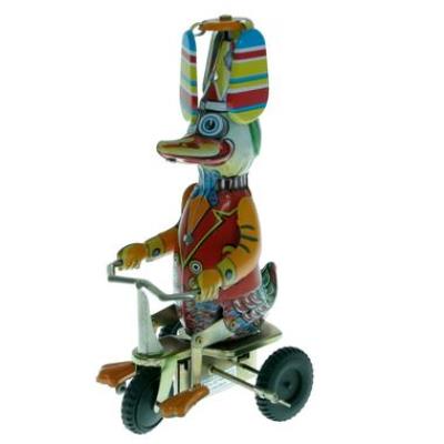 Canard à hélices pédalant sur son tricycle Jouet mécanique en fer blanc à clé