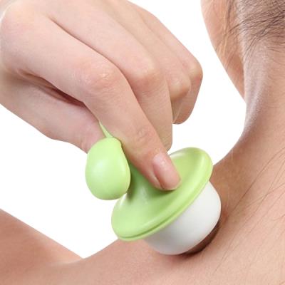 Objet massage en forme de petite fleur