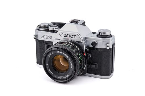 Appareil photo argentique reconditionné Canon AE-1 + 50mm f1.8 FDn Noir gris