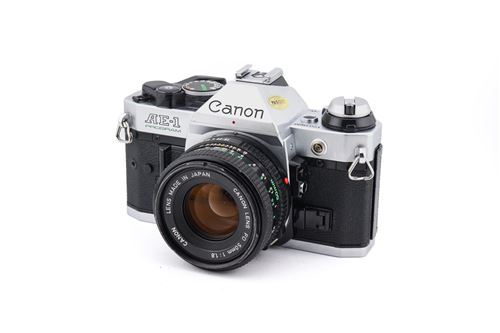 Appareil photo argentique Canon AE-1 Program Noir et Argent + 50 mm f1.8 FDn Reconditionné
