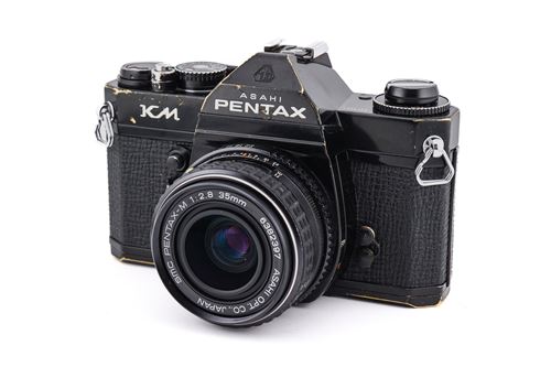Appareil photo argentique reconditionné Pentax KM + 35mm f2.8 SMC Pentax-M Noir gris