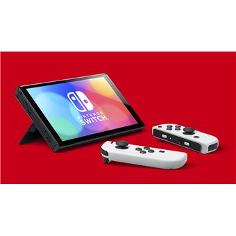 Nintendo Switch (modèle OLED) avec station d’accueil et manettes Joy-Con blanches