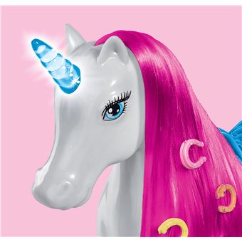 Licorne lumineuse pour poupees mannequins 29cm. La corne et la selle s''illuminent. 1 brosse et 6 barrettes incluses. 3 piles LR44 incluses. Poupee mannequin non incluse.