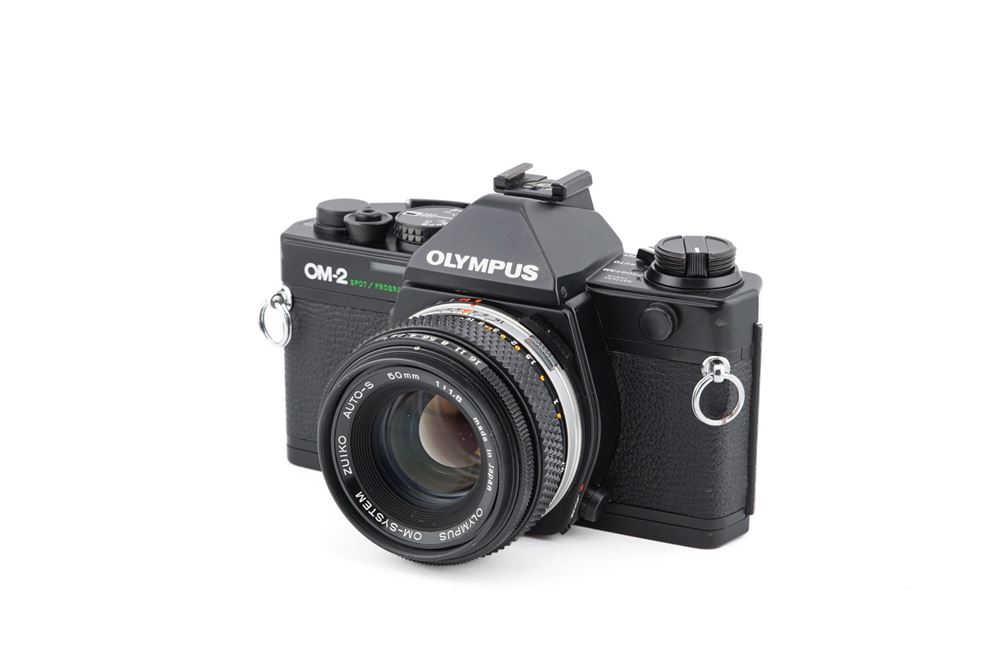 Appareil photo argentique Olympus OM-2 Spot Program + 50mm f1.8