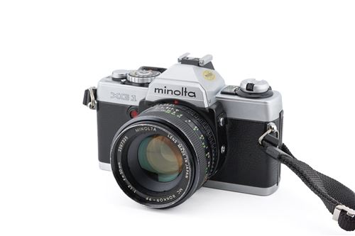 Appareil photo argentique Minolta XG1 + 50mm f1.7 MC Rokkor-PF Noir et Gris Reconditionné