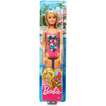 une Barbie poupée séance sur le plage avec une boisson 27291841