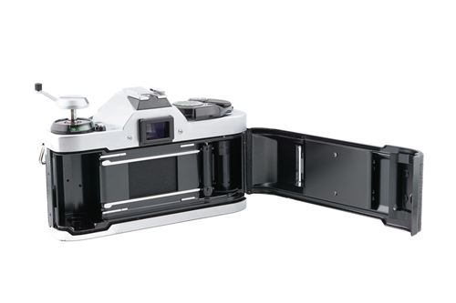 Appareil Photo Argentique Canon AE-1 Avec Zoom 20mm Et Flash Cobra – Argenté – Occasion