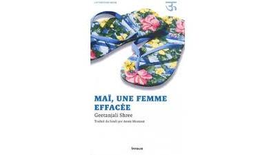Maï, Une femme effacée