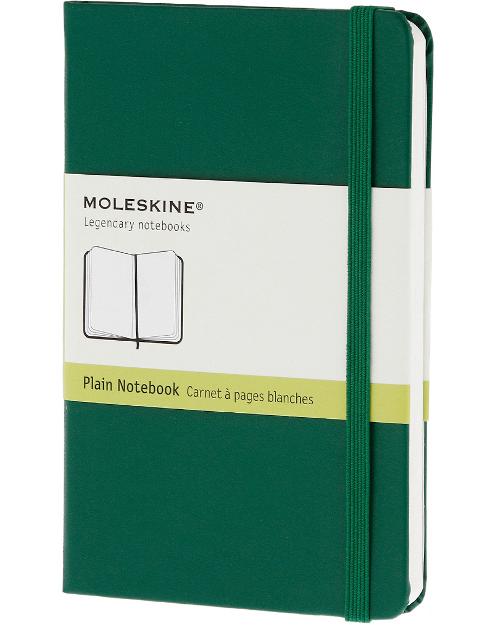 poche pages blanches vert couv rigide et journaux