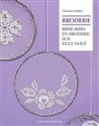 Brise-bises en broderie sur filet nou