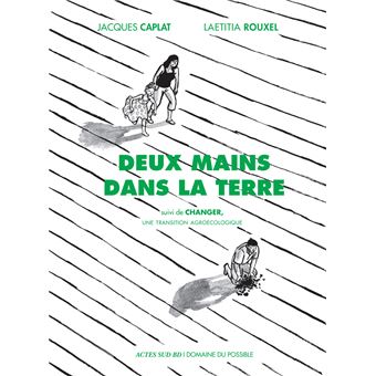 Deux mains dans la terre