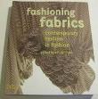 Fashioning fabriques contemporary textiles in fashion