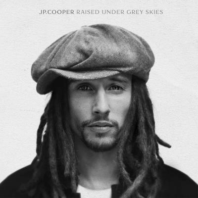 Raised Under Grey Skies