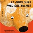 Le gros ours avec des taches