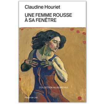 Une femme rousse à sa fenêtre