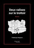 Deux valises sur le trottoir