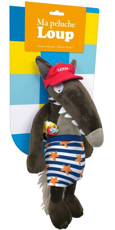 La peluche du Loup à la plage