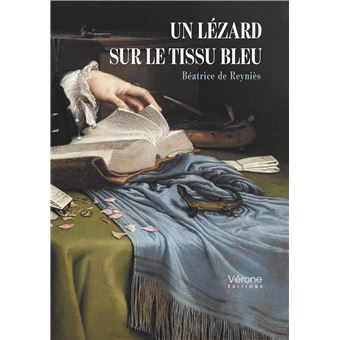 Un lézard sur le tissu bleu - 1