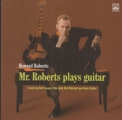 Mr. Roberts plays guitar